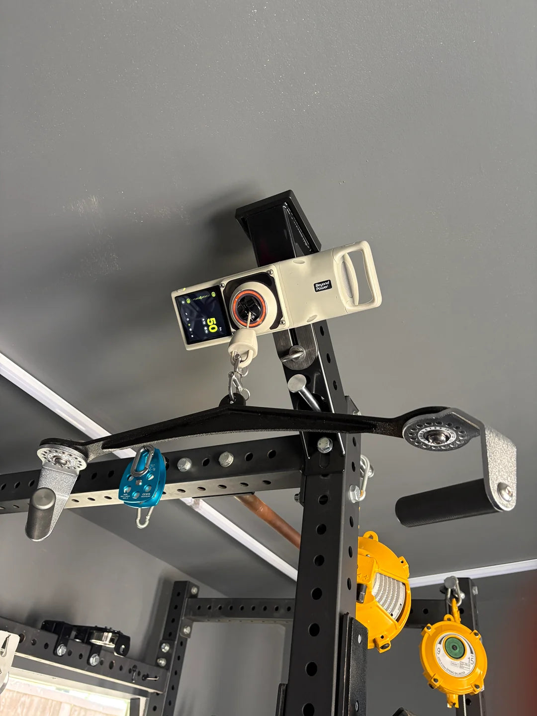 Rep Fitness Storage Feet as Lat Extension